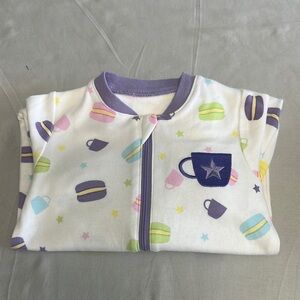 Tuffy White and Purple Onesie Sleeper with Café Charm and macaron pattern